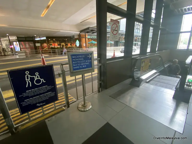 Sign you are looking for that shows you the correct escalator to get to the bus from KL Sentral to Genting