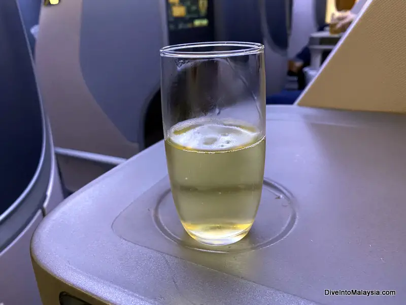 Welcome champagne in Singapore Airlines business class