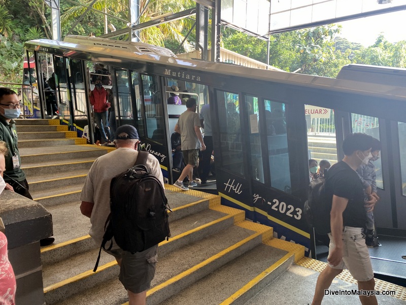 Getting on the funicular train Penang Hill