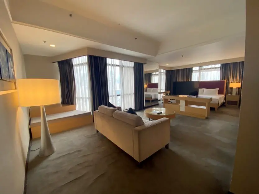 Berjaya Times Square Hotel Two bedroom suite Entry to the main bedroom/living area with a day bed to the side