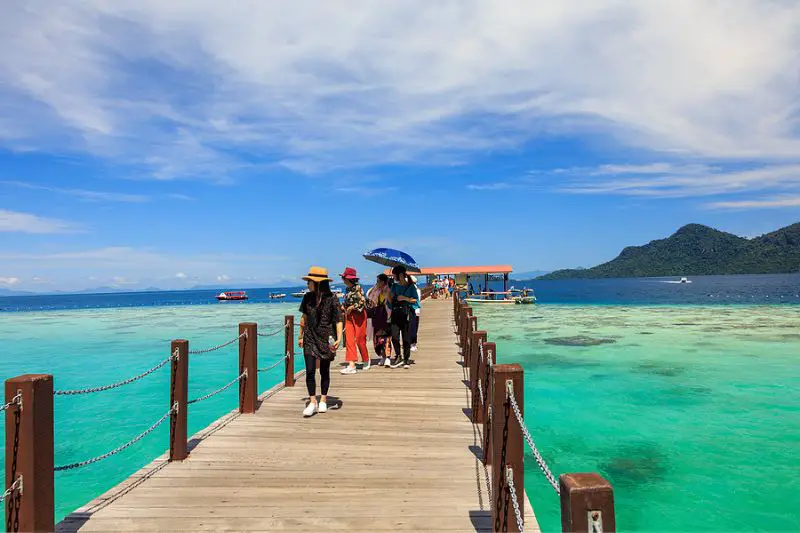 tourists at Bohey Dulang Island jetty Semporna Sabah