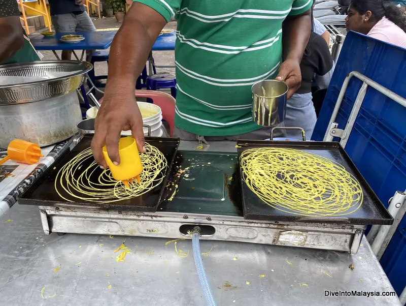 Watching roti jala being made in penang