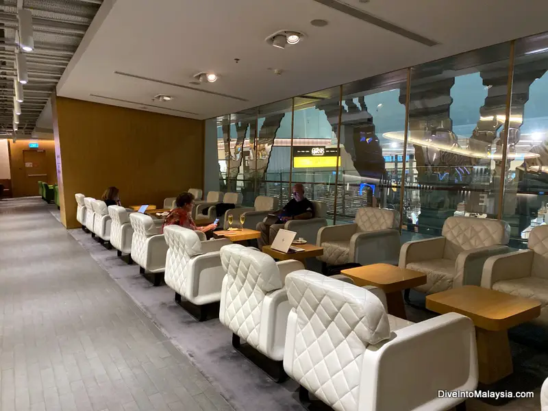 Qantas lounge in Singapore seating area with terminal views