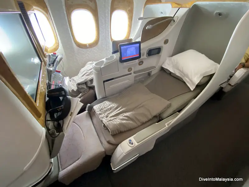 business class Emirates 777-300 seat fully reclined